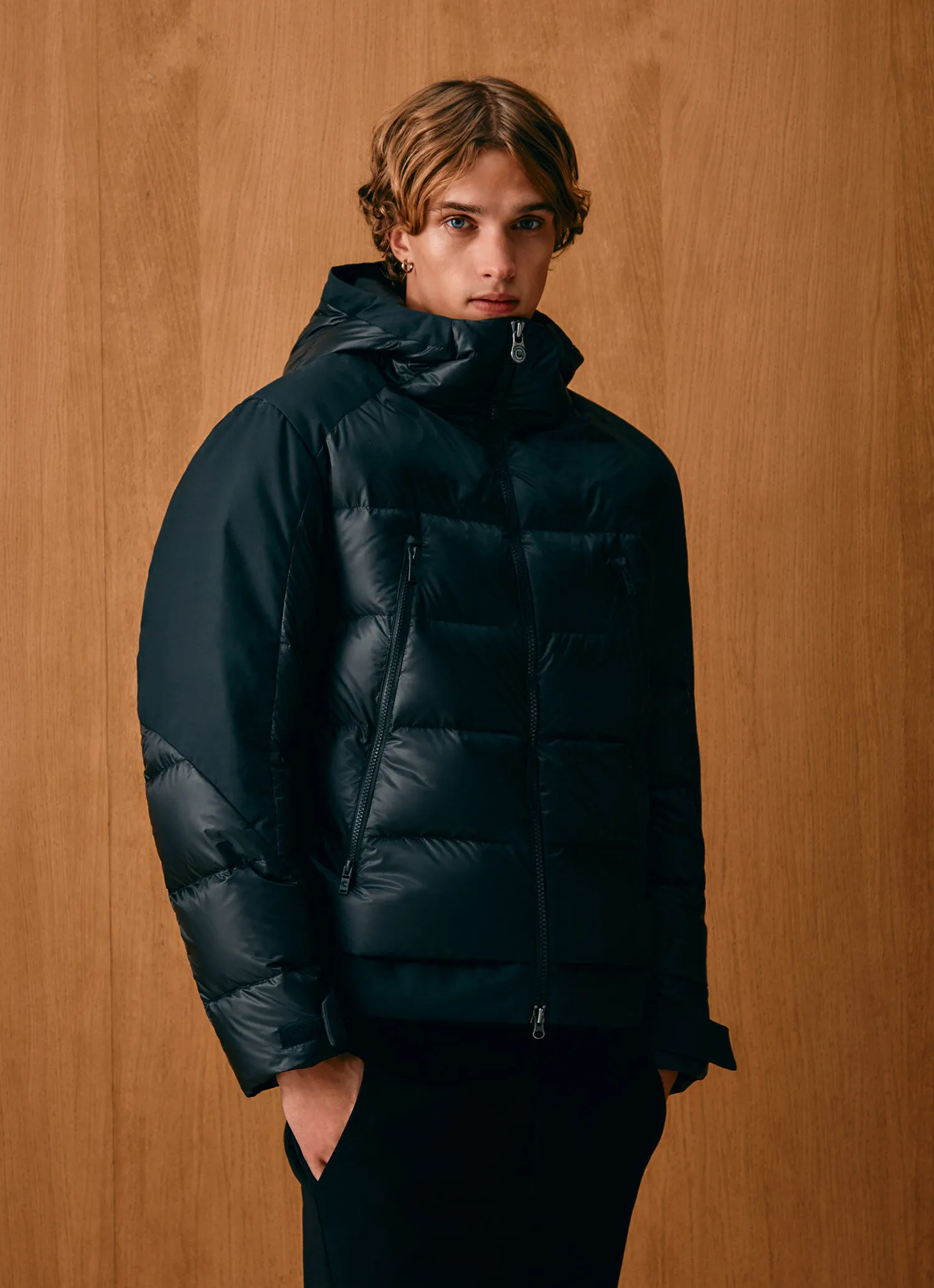 Down jacket with waxed sleeves-