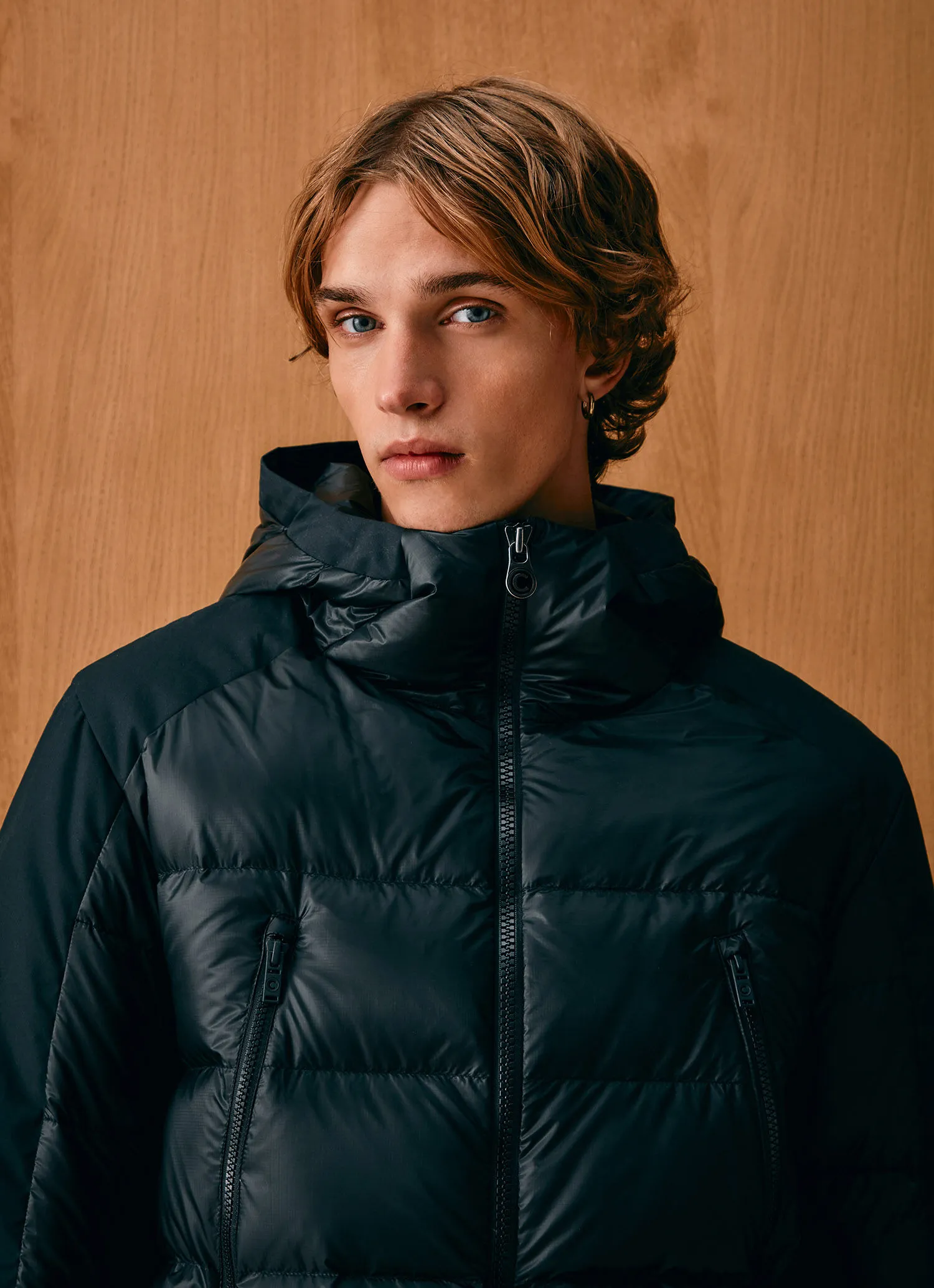 Down jacket with waxed sleeves-