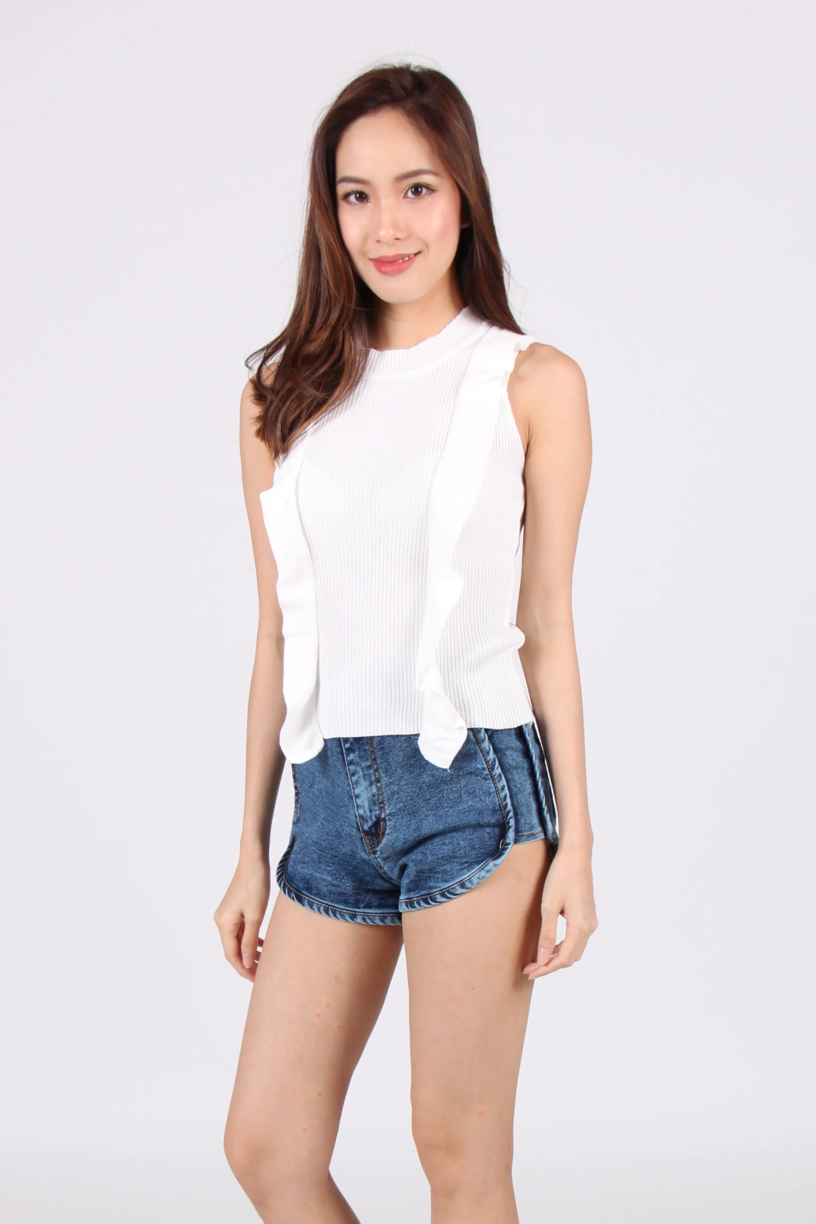 Front Ruffles Down Sleeveless Knit Top in White